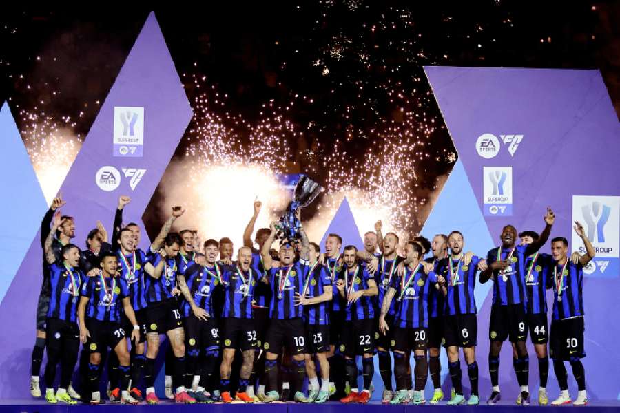 Inter players celebrate their Super Cup success