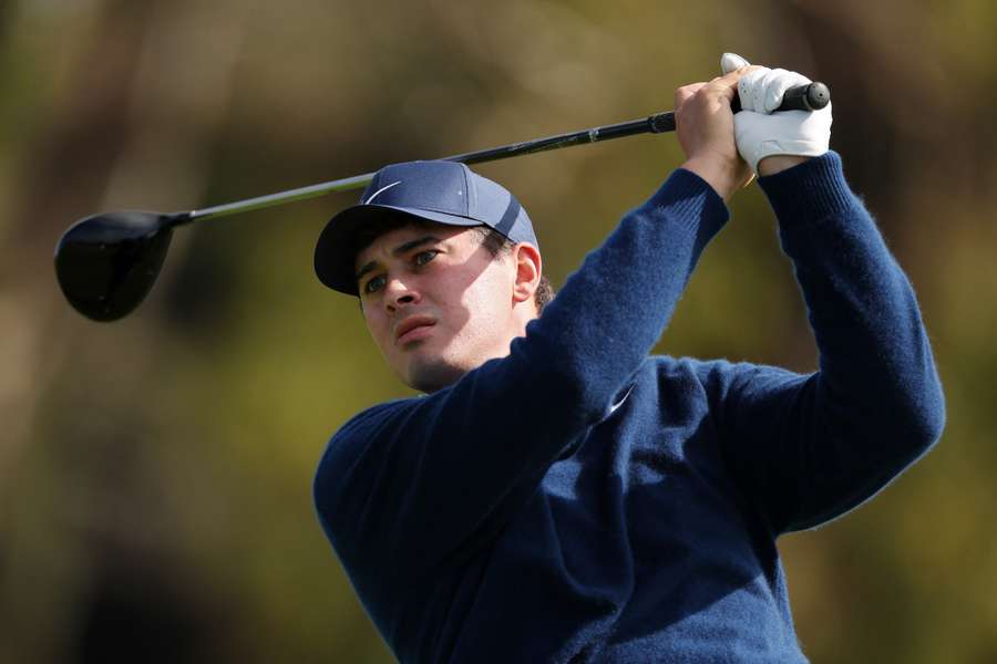 Davis Thompson plays a shot from the 14th tee during the second round of The Genesis Invitational