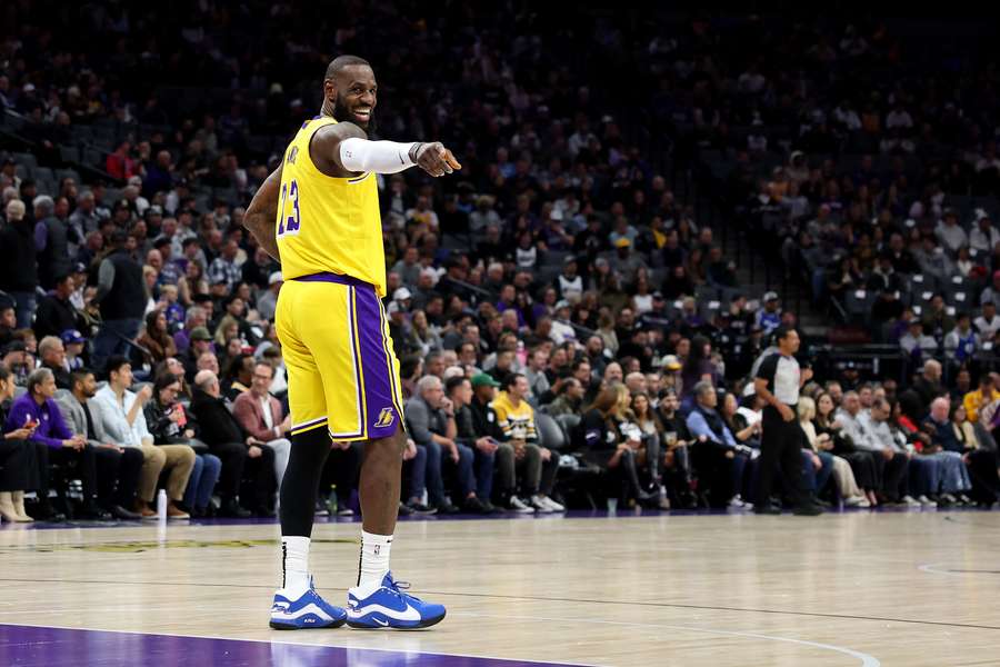 LeBron James of the Los Angeles Lakers set the record for career NBA minutes played in his team's game at Sacramento