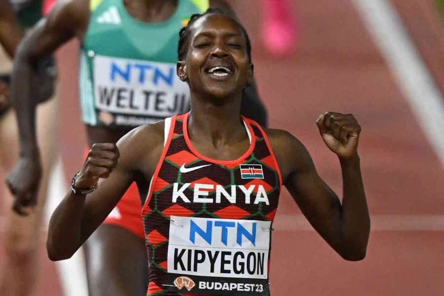 Faith Kipyegon reacts after winning gold in the 1,500m final