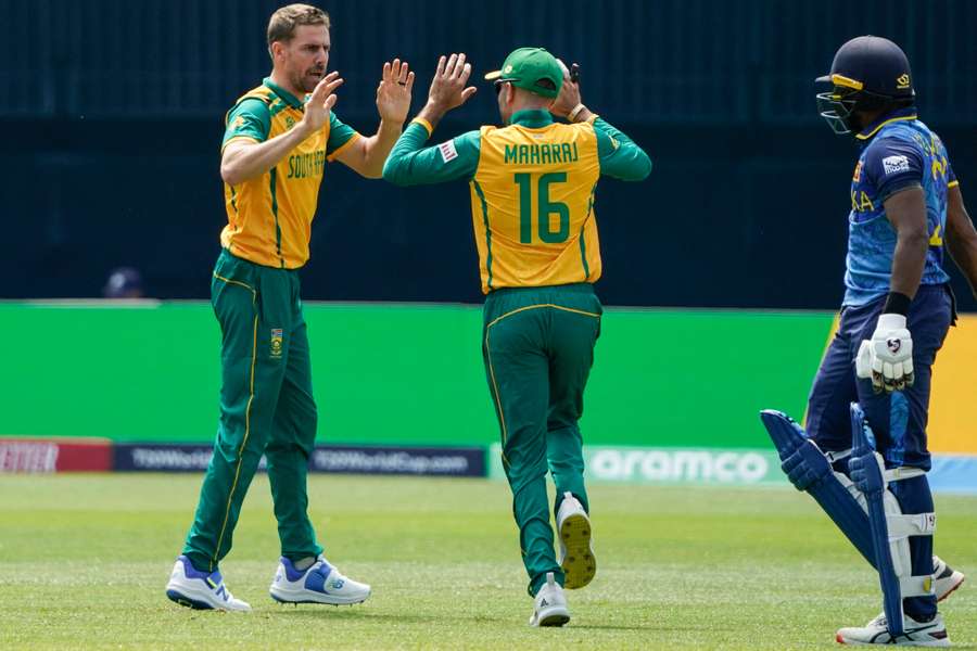Anrich Nortje celebrates taking the wicket of Kamindu Mendis
