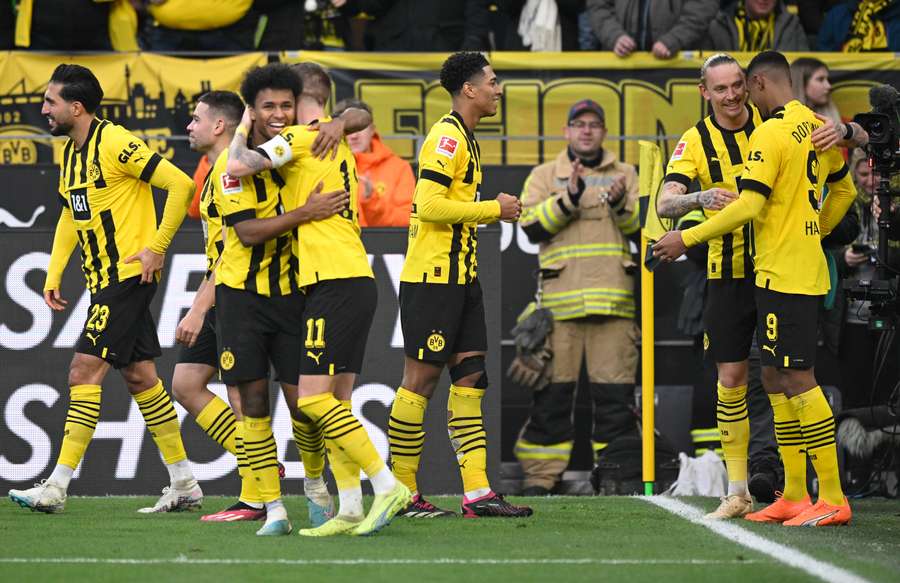 Dortmund's Sebastien Haller (R) celebrates scoring with teammates