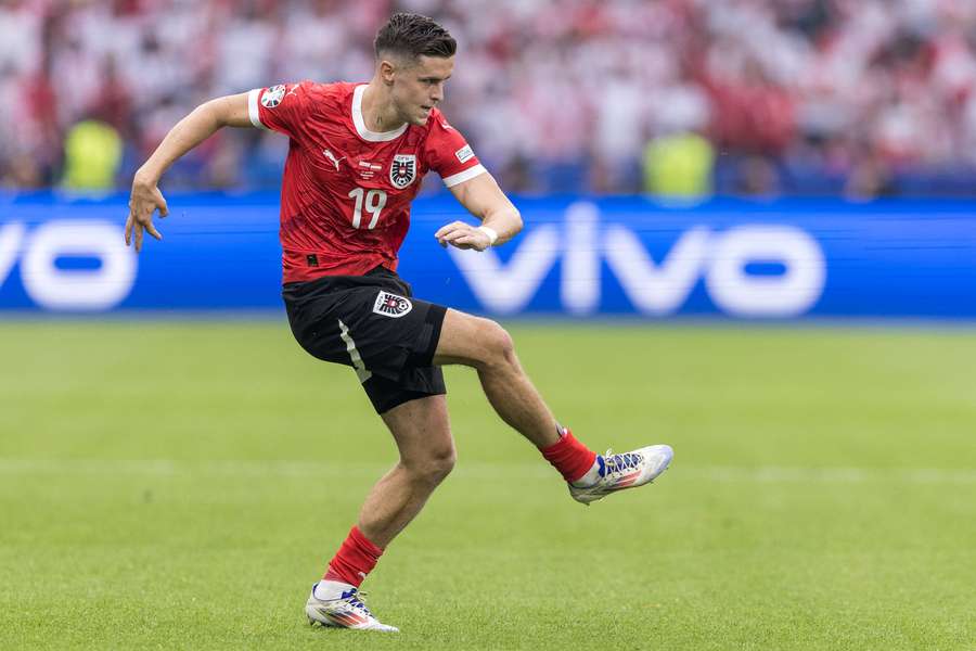 Christoph Baumgartner in actie in de groepswedstrijd tegen Polen