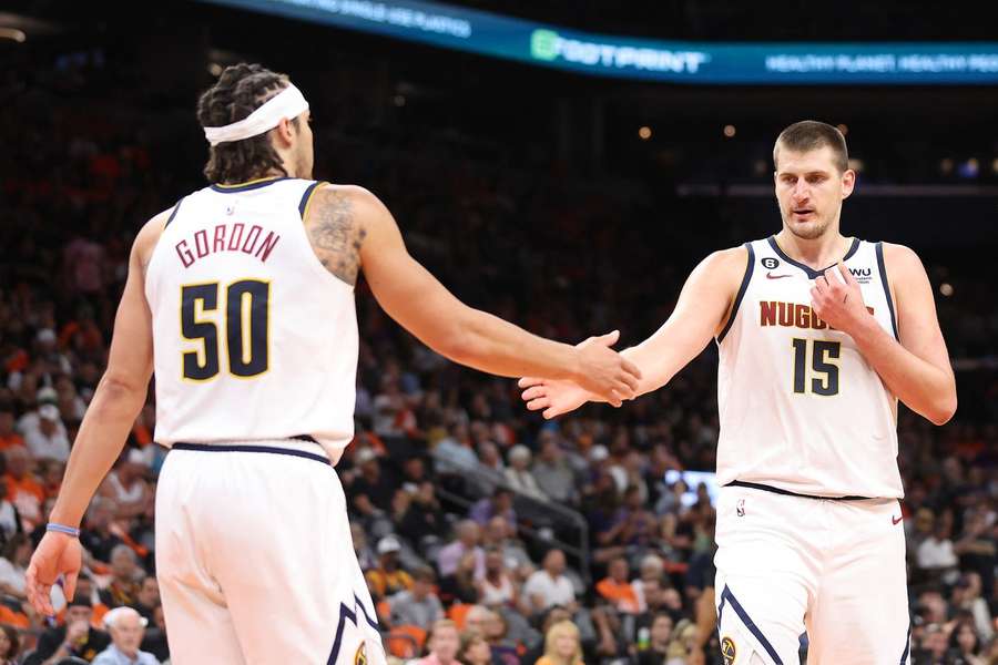 Gordon (left) celebrates with Jokic (right)