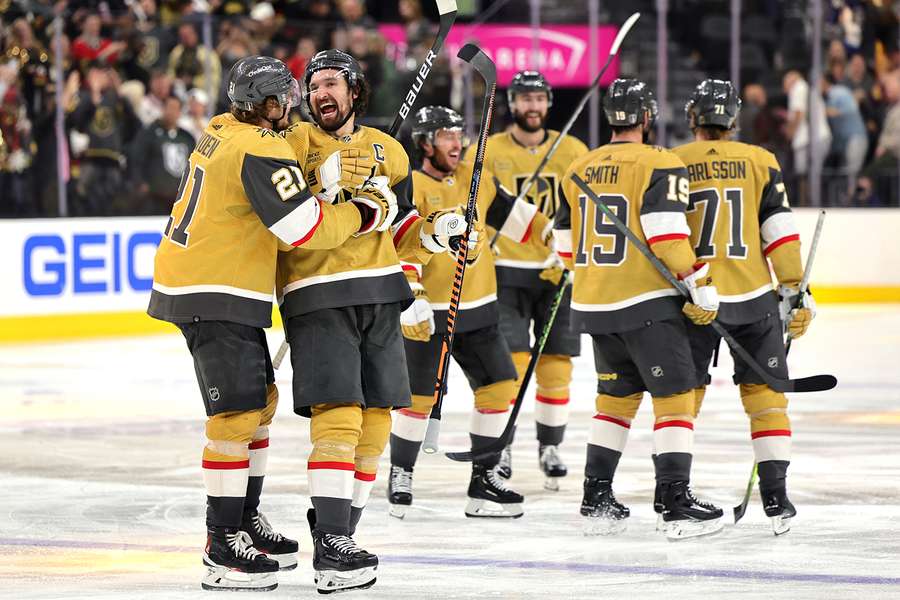 Brett Howden (L) of the Vegas Golden Knights is congratulated by Mark Stone after scoring the game-winning goal