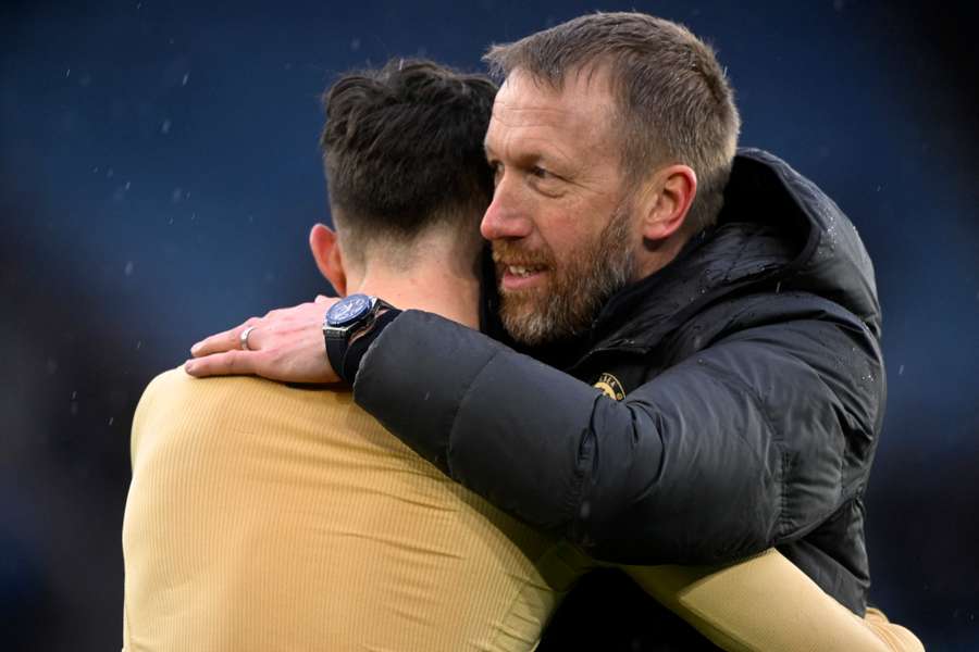 Chelsea manager Graham Potter with Enzo Fernandez after their win against Leicester