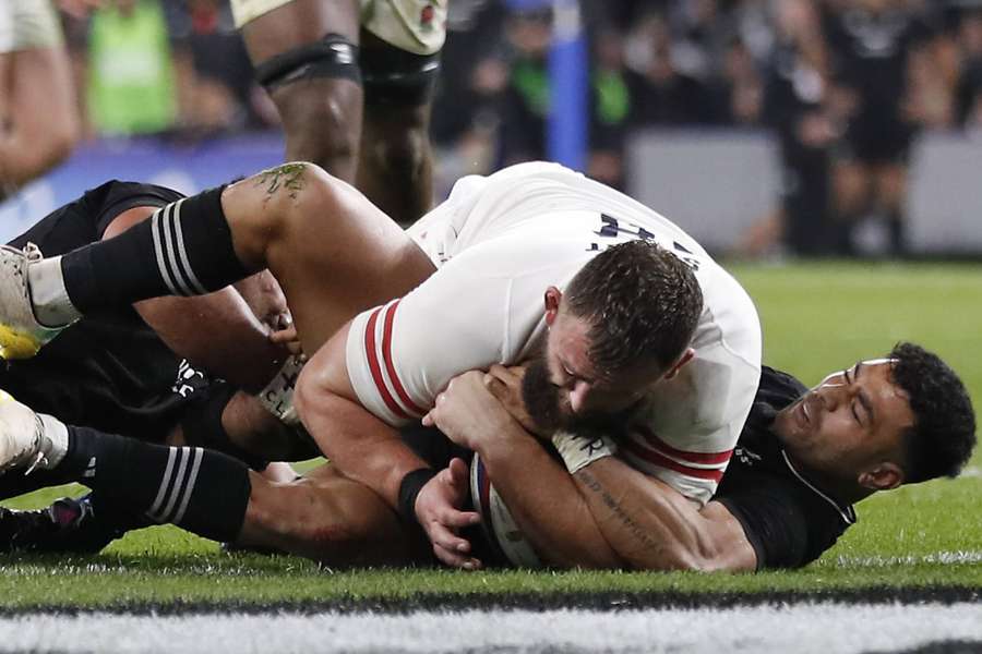 England's prop Will Stuart scores a late try against New Zealand at Twickenham.