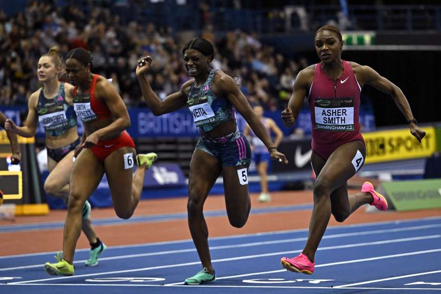 Britain's Dina Asher-Smith (R) beats Britain's Daryll Neita (C) and US sprinter Destiny Smith-Barnett (2R) to the line