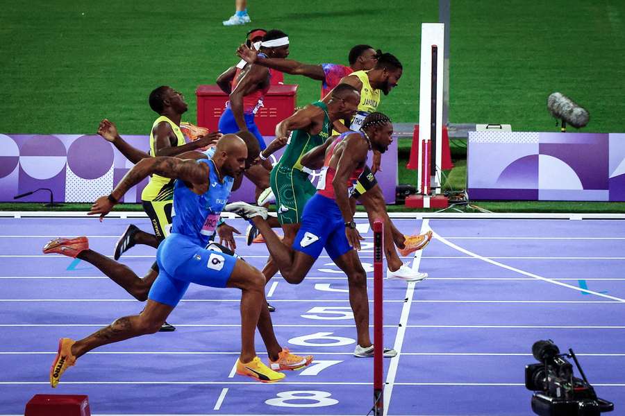 Noah Lyles of United States crosses the line to win gold
