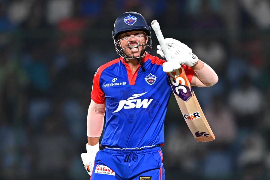 David Warner reacts as he walks back to the pavilion after his dismissal during the IPL match between Delhi Capitals and Mumbai Indians 