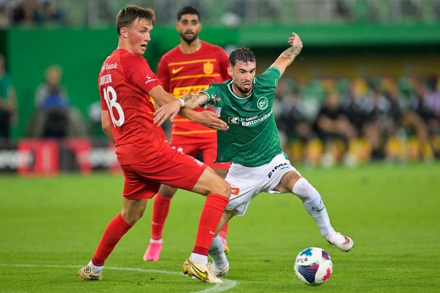 FC Nordsjaelland's Justin Janssen, left, and St. Gallen's Mihailo Stevanovic fight for the ball during Thursday's clash FC Nordsjaelland's Justin Janssen, left, and St. Gallen's Mihailo Stevanovic fight for the ball during Thursday's clash