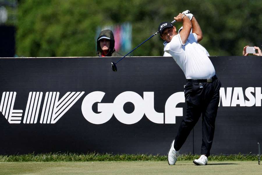 Patrick Reed hits his tee shot on the ninth hole during the Pro-Am tournament as part of the LIV Golf Washington event