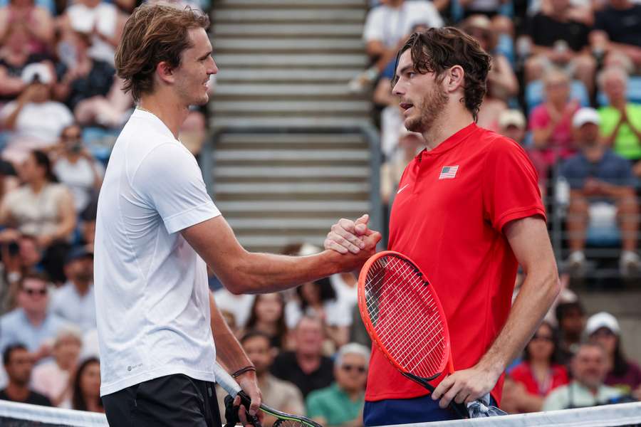 Fritz (R) shakes hands with Zverev after his straight-sets victory