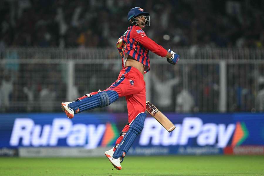 Lucknow Super Giants player Mukul Choudhary celebrates after scoring the winning runs against Kolkata