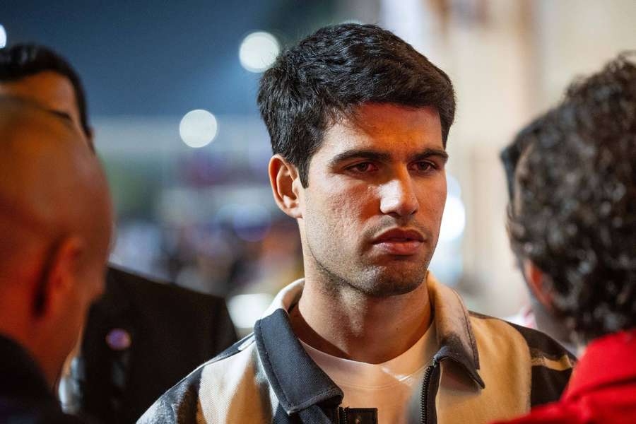 Carlos Alcaraz is in action in Doha