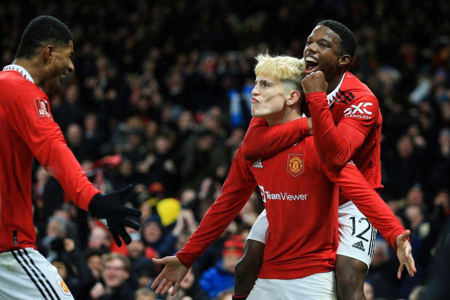 Manchester United's Argentinian midfielder Alejandro Garnacho celebrates after scoring his team's second goal 