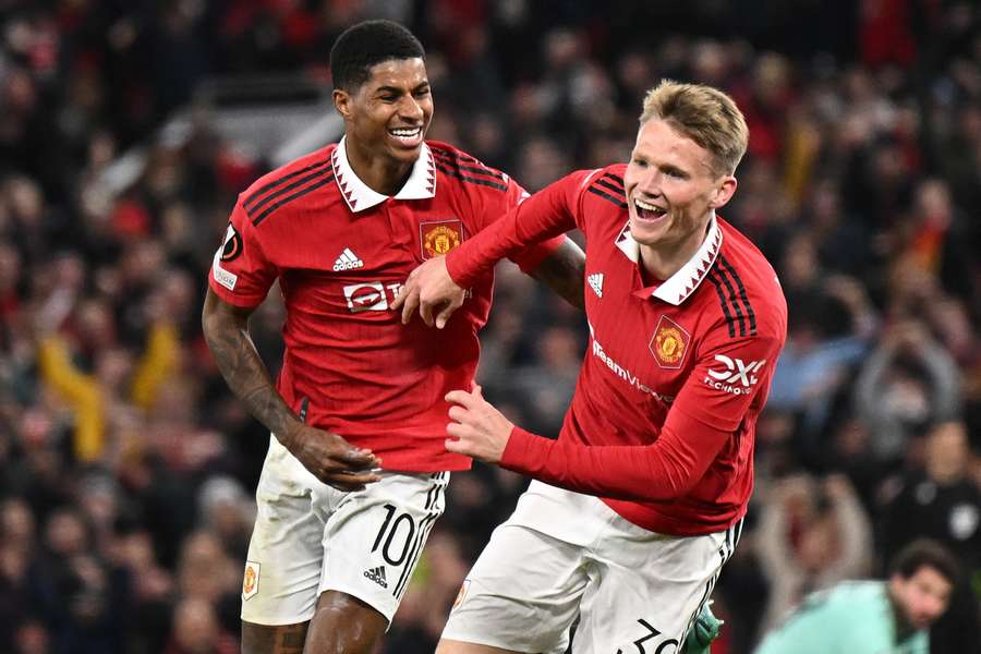 Scottish midfielder Scott McTominay (R) celebrates with Manchester United's English striker Marcus Rashford 