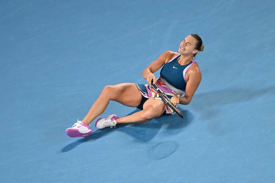 The victorious Belarusian collapsed to the court in tears upon winning