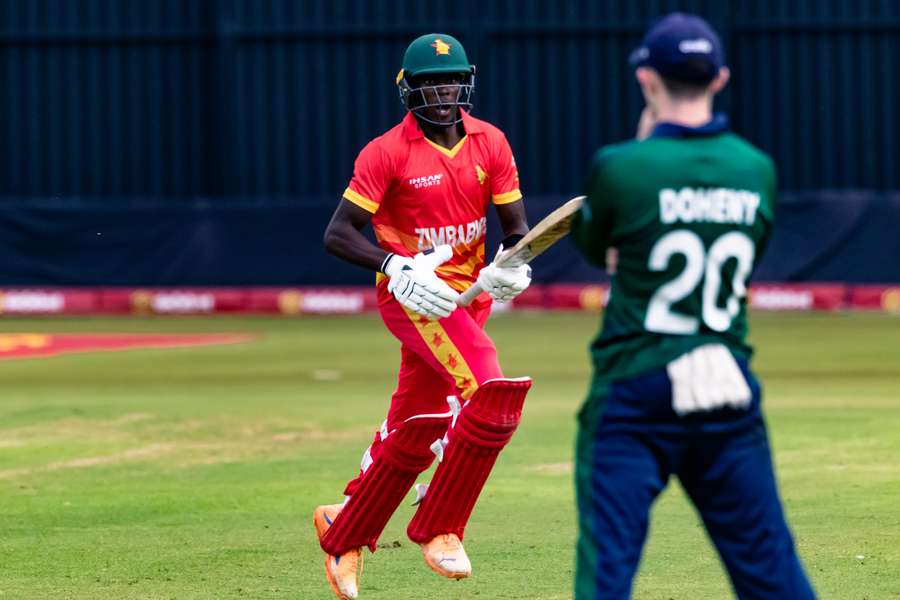 Zimbabwe's Clive Madande celebrates after hitting the winning runs against Ireland