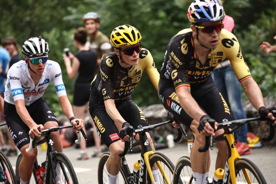 Jumbo-Visma's Wout Van Aert (R), Jumbo-Visma's Jonas Vingegaard (C) and UAE Team Emirates' Tadej Pogacar