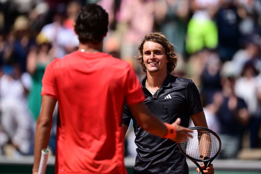 Germany's Alexander Zverev shakes hands with South Africa's Lloyd Harris