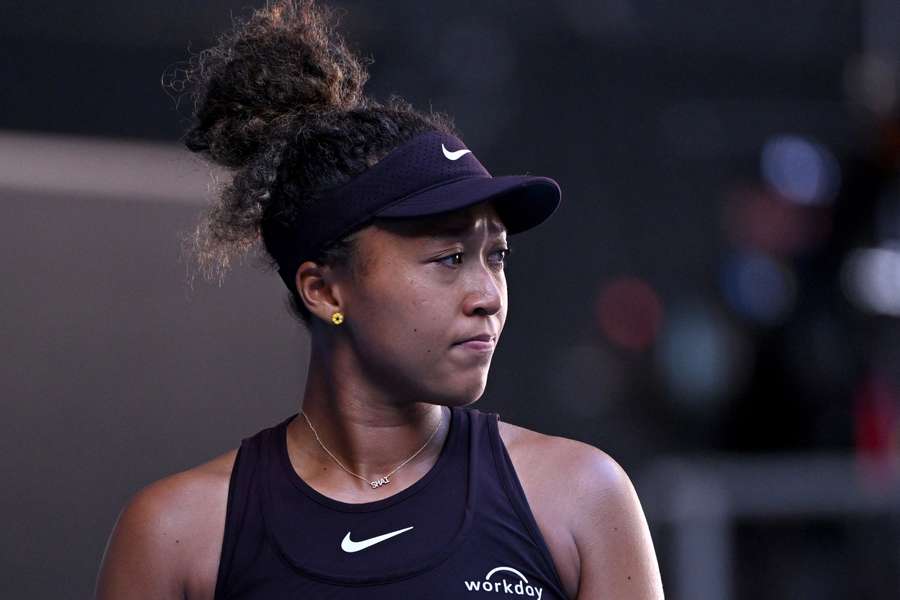 Naomi Osaka reacts after consulting with her coach during her Australian Open match against Belinda Bencic