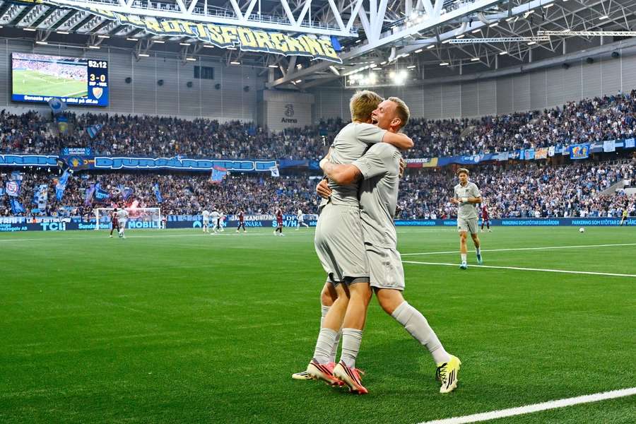 Kristian Lien (right) celebrates his second goal with Bo Hegland