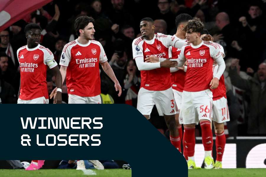 Arsenal's players celebrate with Dowman (R)