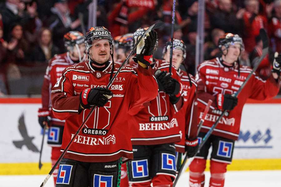 Orebro players celebrate victory over Frolunda