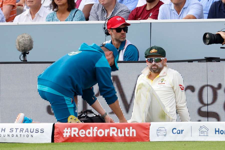 Nathan Lyon receives treatment on his calf 