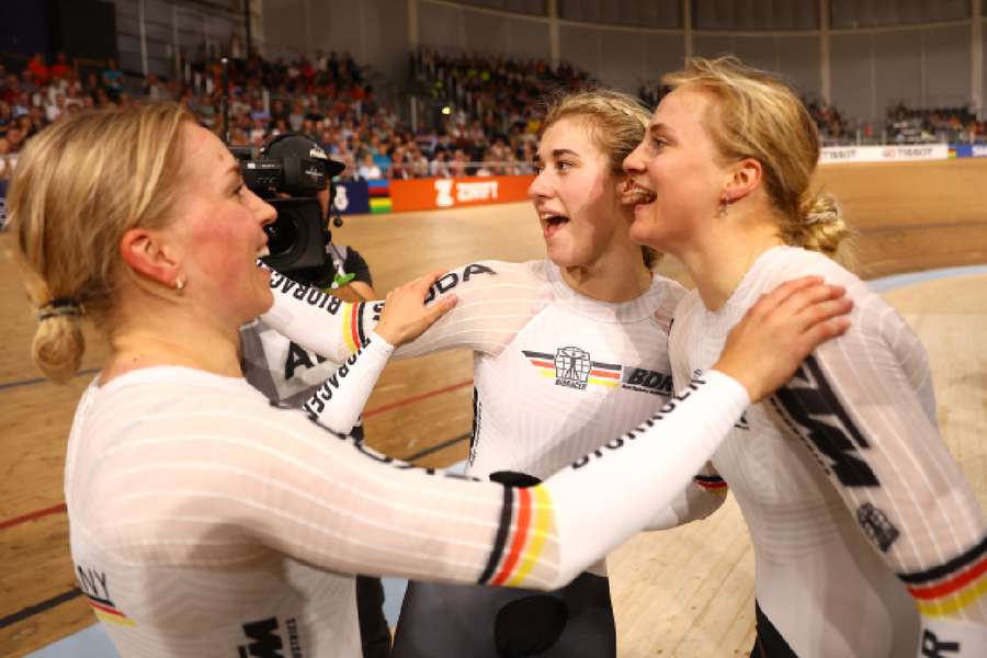 Germany's sprinters celebrate together after gold medal win