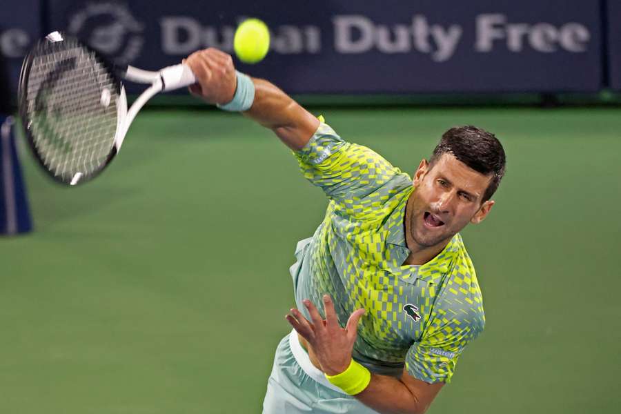 Serbia's Novak Djokovic hits a return against Netherlands' Tallon Griekspoor