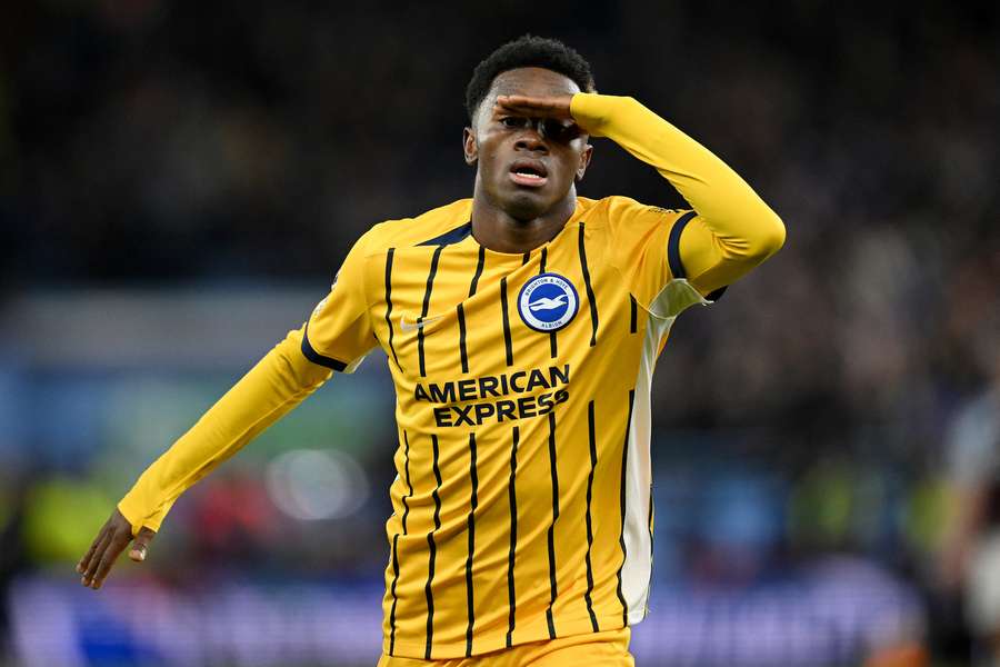 Simon Adingra celebrates after scoring for Brighton