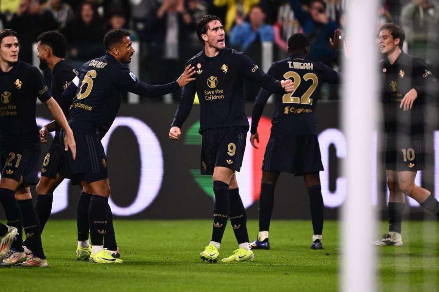 Juventus celebrate their late goal