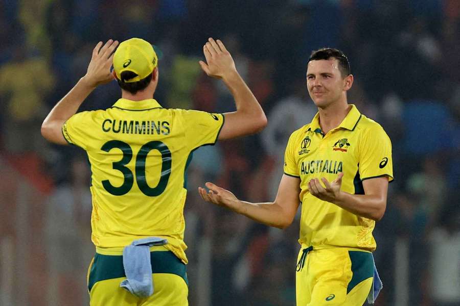 Josh Hazlewood and Pat Cummins in action for Australia