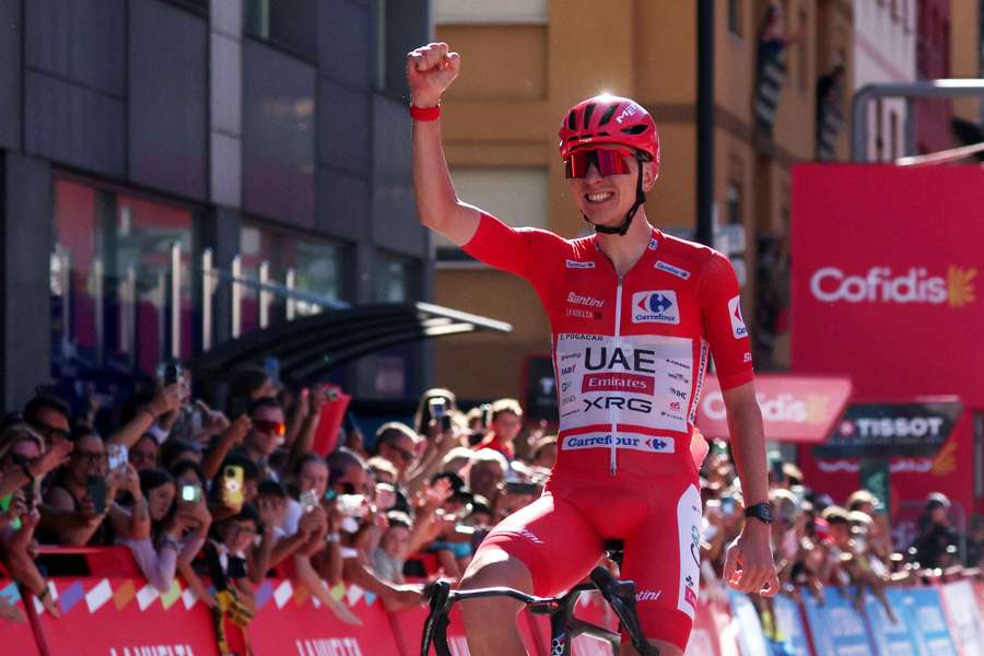 Pogacar storms to Vuelta a Espana stage four solo triumph Pogacar storms to Vuelta a Espana stage four solo triumph