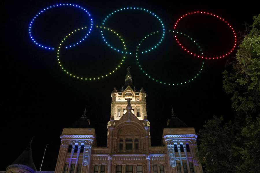 Drones form the Olympic Rings, over the Salt Lake City and County Building as people celebrate the announcement to host the 2034 Winter Olympic