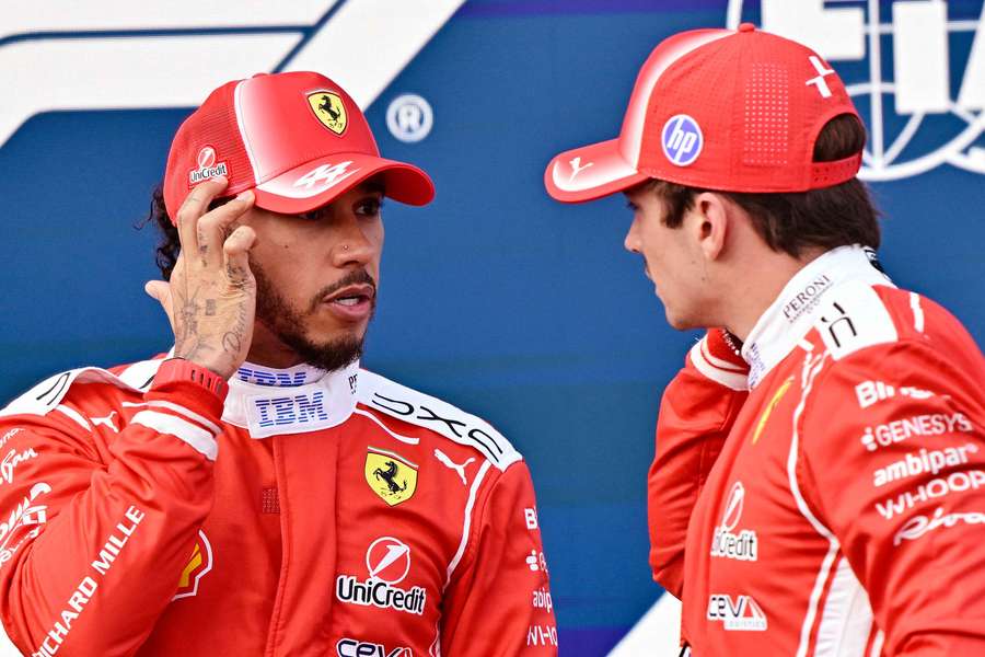 Lewis Hamilton speaks to Ferrari teammate Charles Leclerc after qualifying