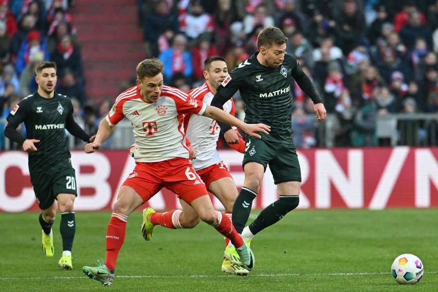 Kimmich (L) in action for Bayern