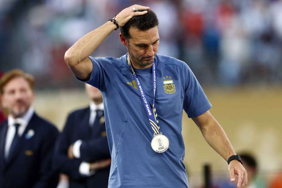 Argentina coach Lionel Scaloni looks dejected after receiving his runners up medal during the trophy presentation Argentina coach Lionel Scaloni looks dejected after receiving his runners up medal during the trophy presentation