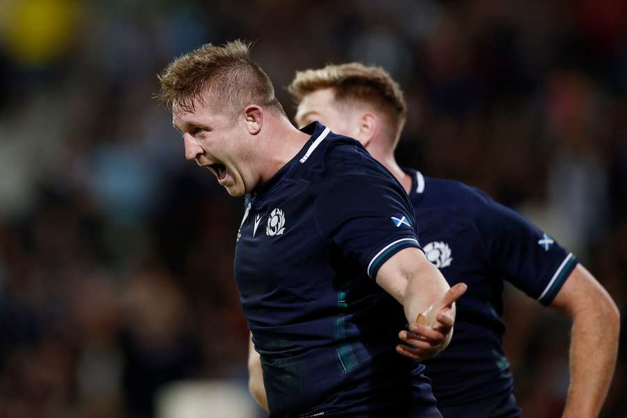 Scotland's Johnny Matthews celebrates scoring a try