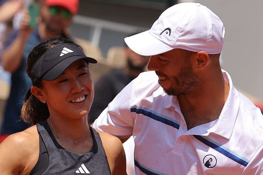 Japan's Miyu Kato (L) and Germany's Tim Puetz (R)