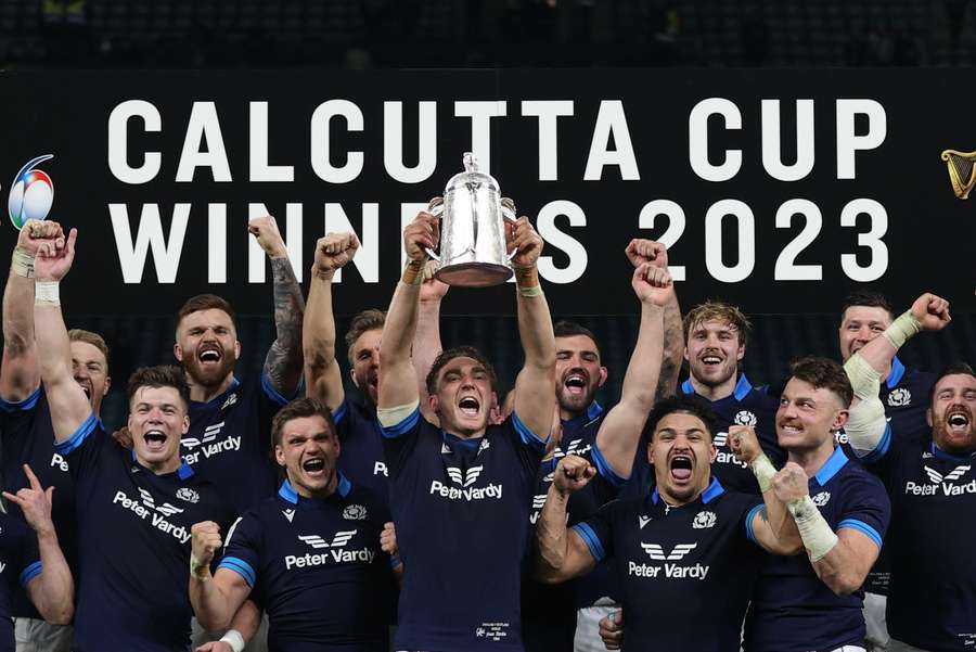 Scotland's flanker Jamie Ritchie lifts the Calcutta cup as he celebrates with teammates