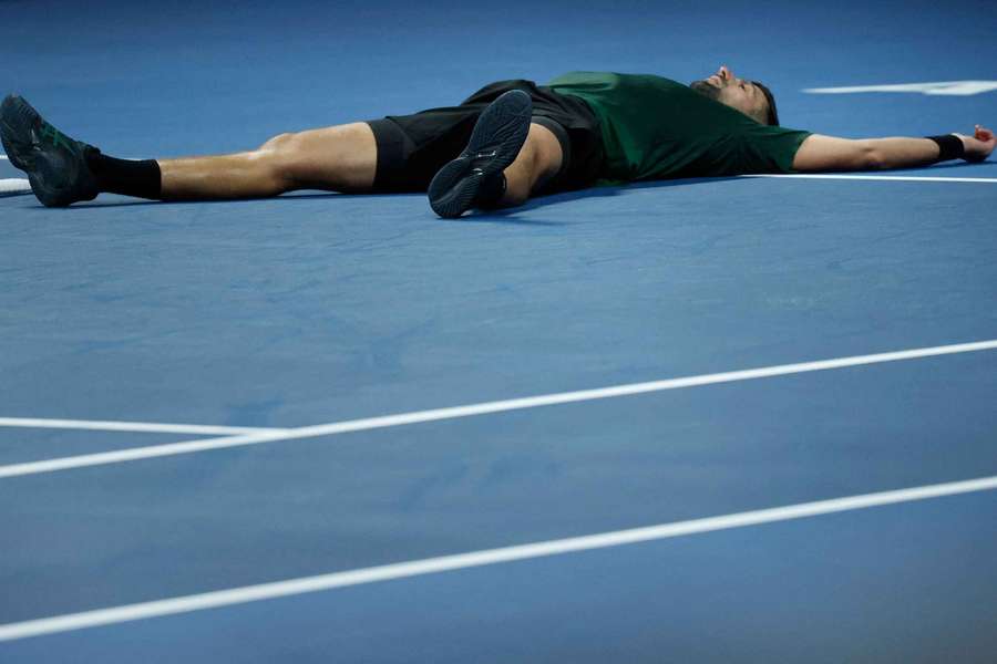 Novak Djokovic lays on the court in Athens Novak Djokovic lays on the court in Athens