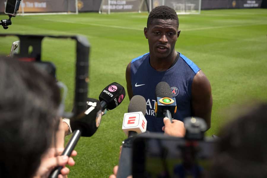 Nuno Mendes speaks to reporters during a PSG training session ahead of the Club World Cup final on Sunday