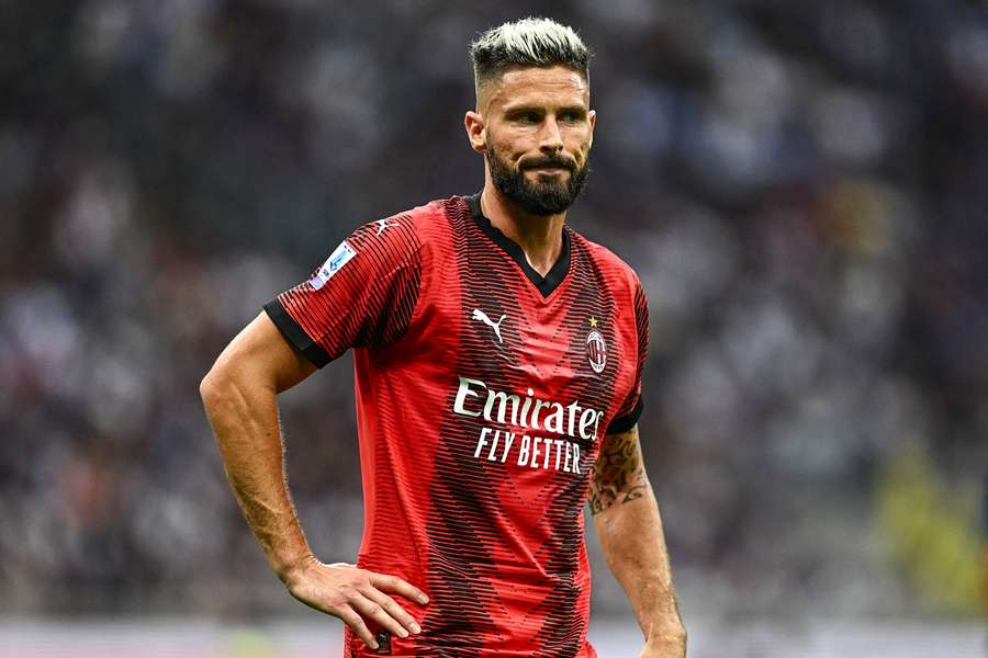 AC Milan's French forward #09 Olivier Giroud reacts during the Italian Serie A football match between Inter Milan and AC Milan