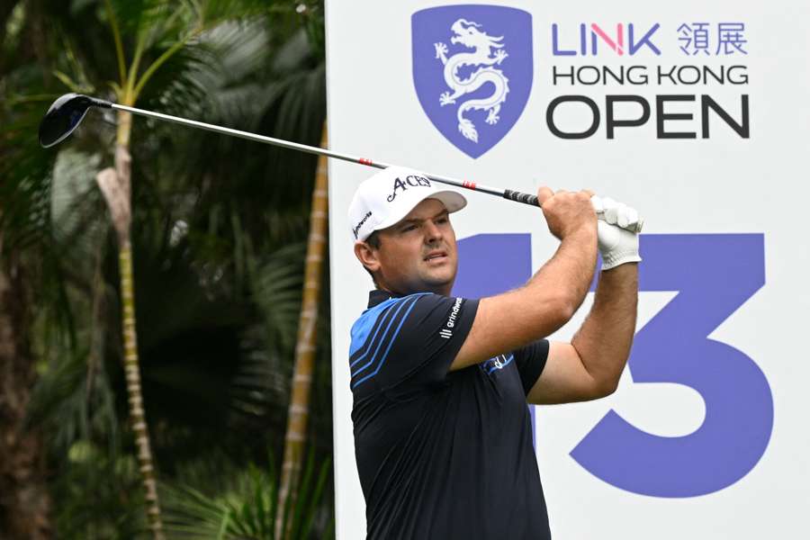 Patrick Reed hits a tee shot