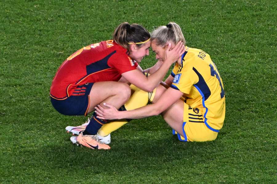 Fridolina Rolfo is consoled by Spain's Mariona Caldentey