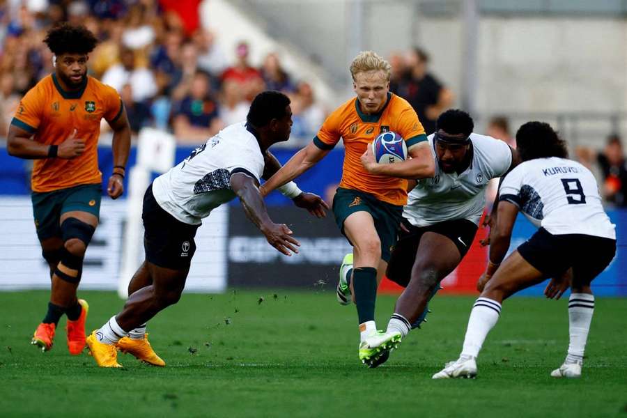 Australia's Carter Gordon in action against Fiji