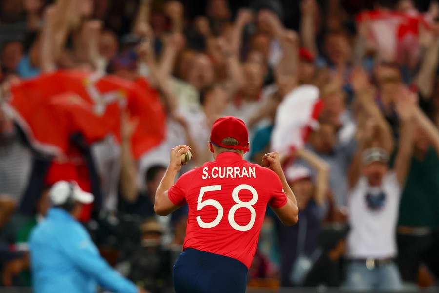 England's Sam Curran celebrates his catch to dismiss New Zealand's Jimmy Neesham